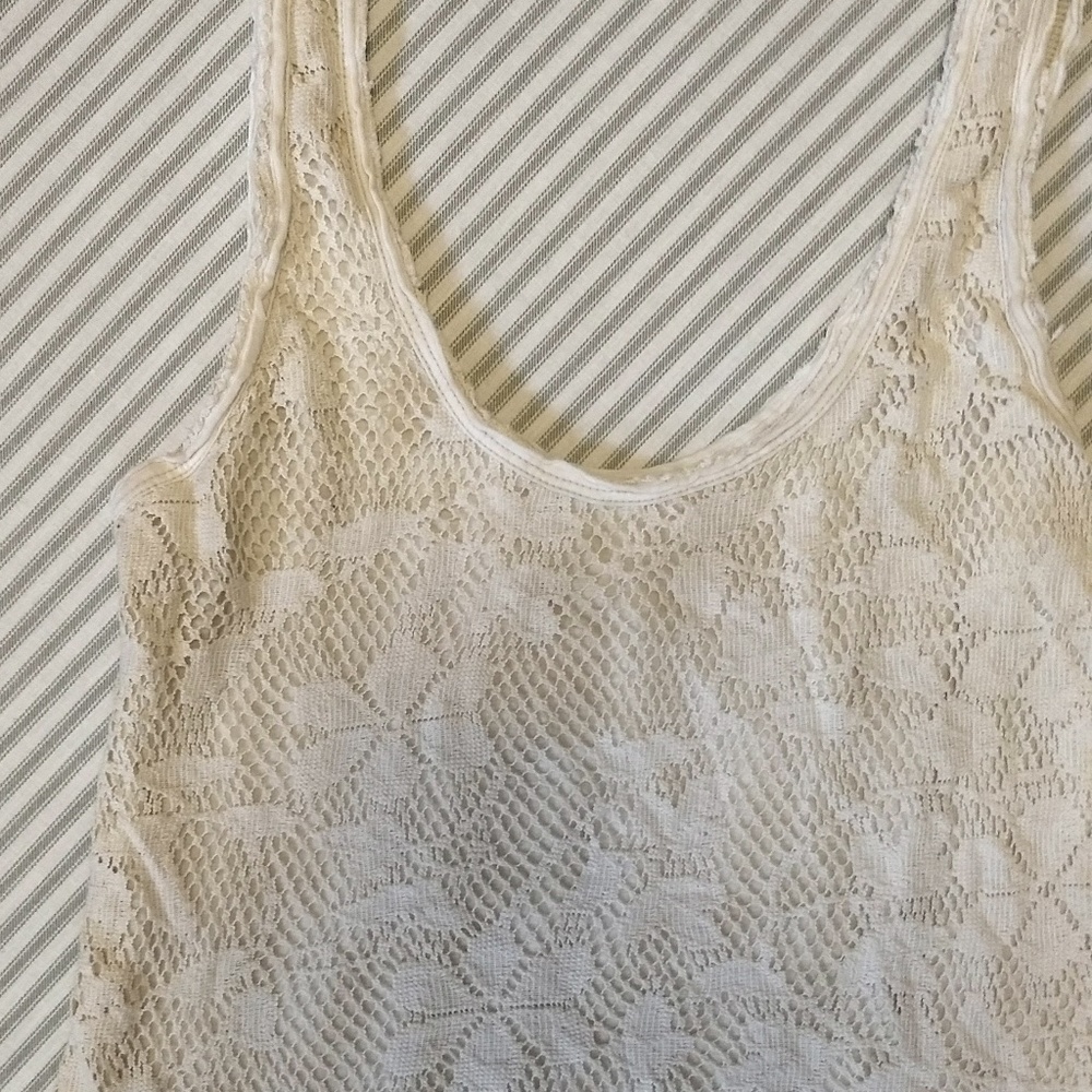 Free People cream colored tank top